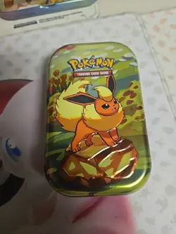 *EMPTY NO PACKS* Pokemon Prismatic Mini Tin Includes Art Card & Coin. Flareon - Image 2