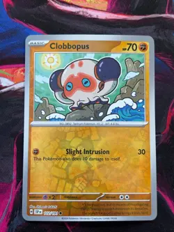 Clobbopus 112/191 Reverse Holo Pokemon TCG Surging Sparks NM - Image 1