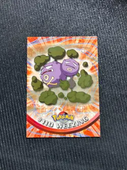 1999 Pokemon Card Topps - Weezing #110 - Series 1 Blue Logo LP - Image 1