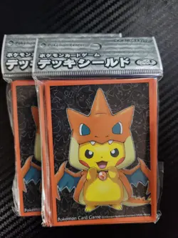 Pokemon Center Mega Charizard Poncho Pikachu Sleeves (64 Count) - Image 1