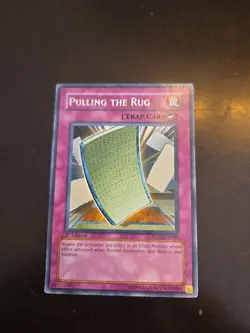Yu-gi-oh! pulling the rug (rare) 1st edition STON-EN060 - Image 1