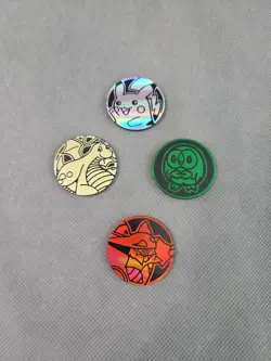 Lot of 4 Pokemon Coins - Pikachu, Rowley, Dragonite Amd Volcanion - Image 1