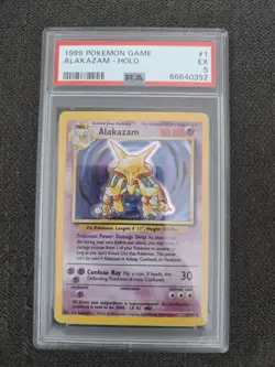 1999 POKEMON GAME ALAKAZAM HOLO BASE SET 1/102 PSA 5 WOTC VTG - Image 1
