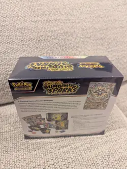 Pokemon TCG Surging Sparks ETB Factory Sealed - in hand - Image 4