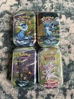 Pokemon TCG Prismatic Evolutions Mini Tins X4 ✅ Factory Sealed Umbreon Included - Image 1