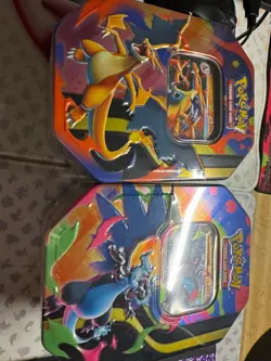 Pokemon TCG - Mega Charizard X ex AND Y ex Tin Set - New / Sealed In Hand - Image 1