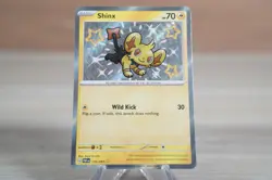 Shinx 135/091 Sv: Paldean Fates Holo Baby Shiny Pokemon Card - Image 1