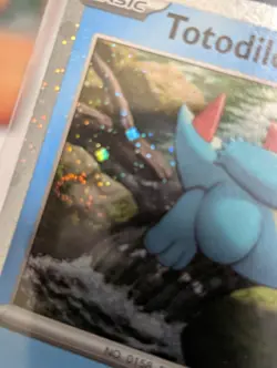 Totodile Cosmos Holo 041/217 Pokemon Promo With Holo Bleed And 2 Swirls 🍥 - Image 2