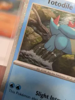 Totodile Cosmos Holo 041/217 Pokemon Promo With Holo Bleed And 2 Swirls 🍥 - Image 3