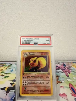 1999 POKEMON JUNGLE 1ST ED #3 FLAREON-HOLO PSA 9 - Image 1