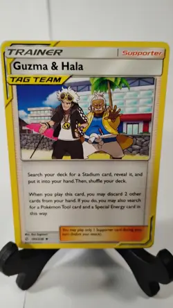 Pokemon Guzma & Hala Tag Team 193/236 Cosmic Eclipse Supporter Regular - Image 1