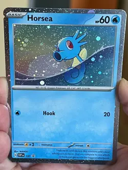 POKEMON HORSEA SVP137 PROMO BLACK STAR COSMOS HOLOFOIL WITH SWIRL NM CARD - Image 1