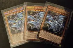 3x Heart of the Blue-Eyes 1st Edition Starlight Rare NM Yugioh Playset - Image 1
