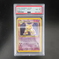 Pokemon Alakazam Holo Rare Base Set 2 1/130 PSA 8 2000 Wizards of the Coast - Image 1