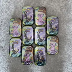 Pokemon TCG Prismatic Evolutions Mini Tins X10 – Brand New & Factory Sealed - Image 1