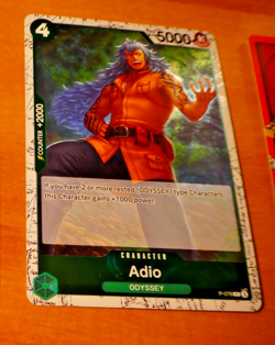 ONE PIECE ENGLISH CARD PROMO HOLO FOIL GAME CARTE ADIO P-078 EN MINT - Image 1
