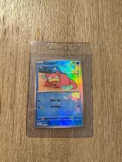 Pokemon Slowpoke 018/131 Sv: Prismatic Evolutions Holo Master Ball Pattern - Image 1