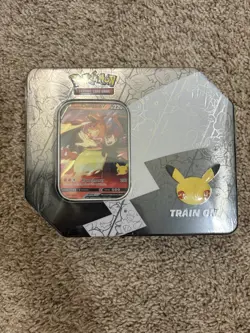 Pokemon 25th Anniversary Celebrations Tin - Lance’s Charizard V - Sealed - Image 1
