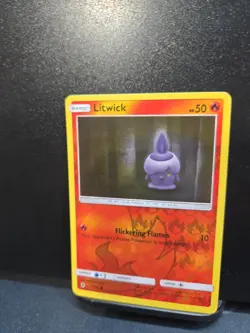 Pokemon TCG Litwick Sun & Moon: Guardians Rising 11/145 Reverse Holo Common - Image 1