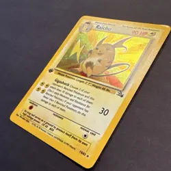 Pokemon Raichu Fossil 1st Edition Holo Rare 14/62 The Pokemon Company Card - Image 2