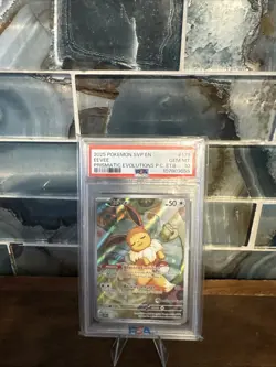2025 POKEMON SVP PRISMATIC EVOLUTIONS POKEMON CENTER ETB PROMO #173 EEVEE PSA 10 - Image 1