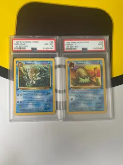 1999 Pokemon Fossil 1st Edition Omanyte #52/62 PSA 9 & Omastar #40/62 PSA 8 - Image 1
