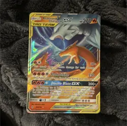 Reshiram & Charizard GX TAG TEAM Ultra Rare Full Art Unbroken Bonds Pokemon Card - Image 1