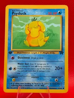 PSYDUCK 65/82 C TEAM ROCKET POKEMON 1ST EDITION NM/M - Image 1