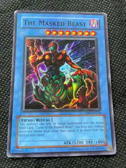 The Masked Beast - DB1-EN214 - Super Rare - Unl Edition - LP - YuGiOh! - Image 1