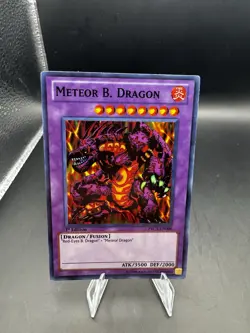 Yu-Gi-Oh! Meteor B. Dragon PRC1-EN004 Premium Tin Super Rare 1st Edition Fusion - Image 1