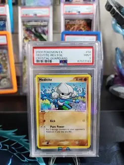 PSA 9 Meditite #56/100 Reverse Holo EX Crystal Guardians 2006 Pokemon TCG Card - Image 1