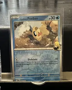 Pokemon TCG Cynthia’s Feebas 052/182 – Reverse Holo – SV10: Destined Rivals NM/M - Image 2