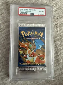 PSA 8 Pokemon TCG Base Set Unlimited Booster Pack Charizard Artwork WOTC 1999 - Image 1