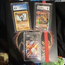 Pokemon TCG Graded Card Lot Charizard VMAX, MCharizard EX, Dark Machoke - Image 1