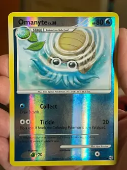 POKEMON OMANYTE LV.38 70/99 COMMON REVERSE HOLOFOIL PLATINUM ARCEUS NM CARD - Image 1