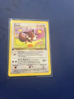 1st Edition Eevee Pokemon Jungle 51/64 Card and boxtop card - Image 1