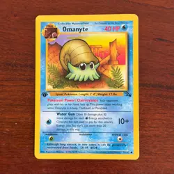 1st Edition Omanyte 52/62 Common Fossil Pokemon Card - Image 1