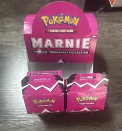 Pokemon TCG: Marnie Premium Tournament Collection Deck Box/Sleeves/Dices/Coins - Image 1