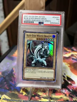 2021 YU-GI-OH! LEGEND DUELISTS: SEASON 2 #EN001 BLUE-EYES WHITE DRAGON PSA 7 - Image 1