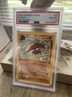 Pokemon TCG Kabuto Fossil 1st Edition Common Card 50/62 Regular PSA 8 - Image 1