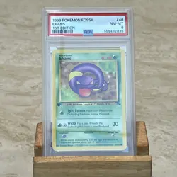 1999 Pokemon Fossil 1st Edition Ekans 46/62 PSA 8 NM-MT - Image 3