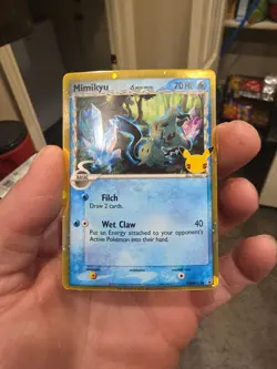 Mimikyu (Delta Species) - SWSH136 - SWSH: Sword & Shield Promo Cards (SWSD) - Image 1