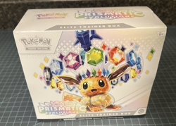 Pokemon TCG: S&V Prismatic Evolutions Elite Trainer Box (Small Tear) - Image 1