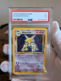 1999 POKEMON GAME ALAKAZAM HOLO BASE SET 1/102 PSA 5 WOTC - Image 1