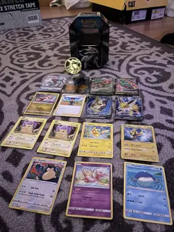 Pokemon Card Lot Plus Tin Container And Collectors Chip - Image 1