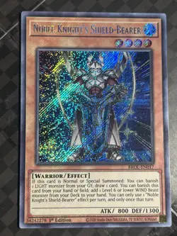 NOBLE KNIGHT'S SHIELD-BEARER 1ST EDITION SECRET RARE BROL-EN017 YUGIOH! NM - Image 1