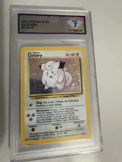 1999 Base Set Unlimited Clefairy Holo 5/102 Pokemon Card CGC 7 Near Mint - Image 1