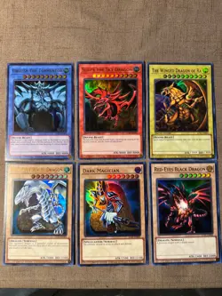YuGiOh 25TH ANNIVERSARY PROMO GOD CARD RA SLIFER OBELISK BLUE RED EYES LC01🔥 - Image 1