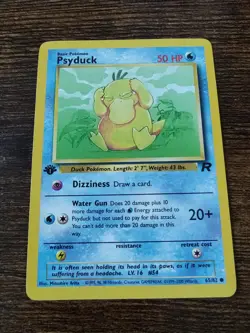 Psyduck 65/82 1st Edition Team Rocket Non Holo Pokemon Card - Image 1