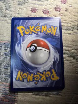 Budew 004/131 - Prize Pack Series 7 Pokemon COSMOS Holo - Image 2